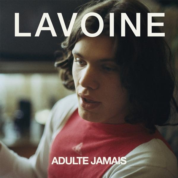 Albumhoes met een man die opzij kijkt.