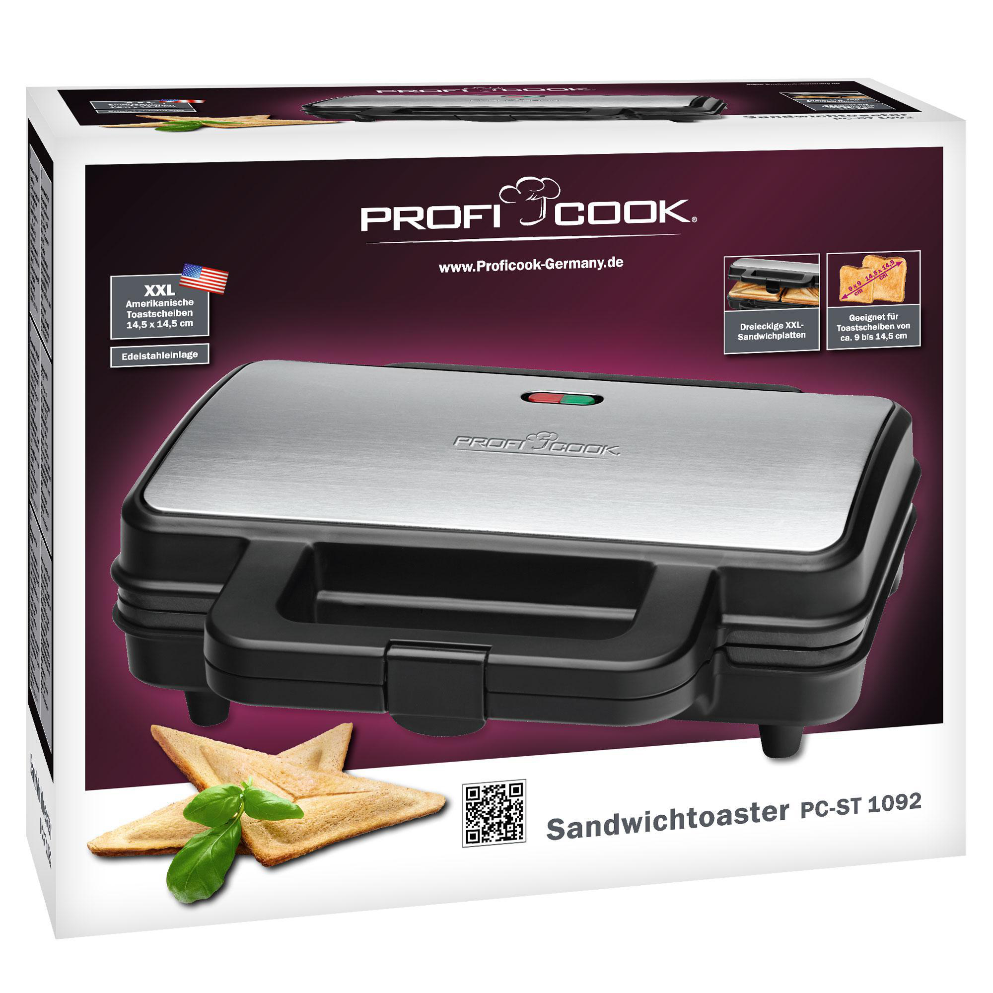 Ein Sandwich-Toaster in einer Box, mit Sandwiches und Basilikumblättern, isoliert auf Weiß.