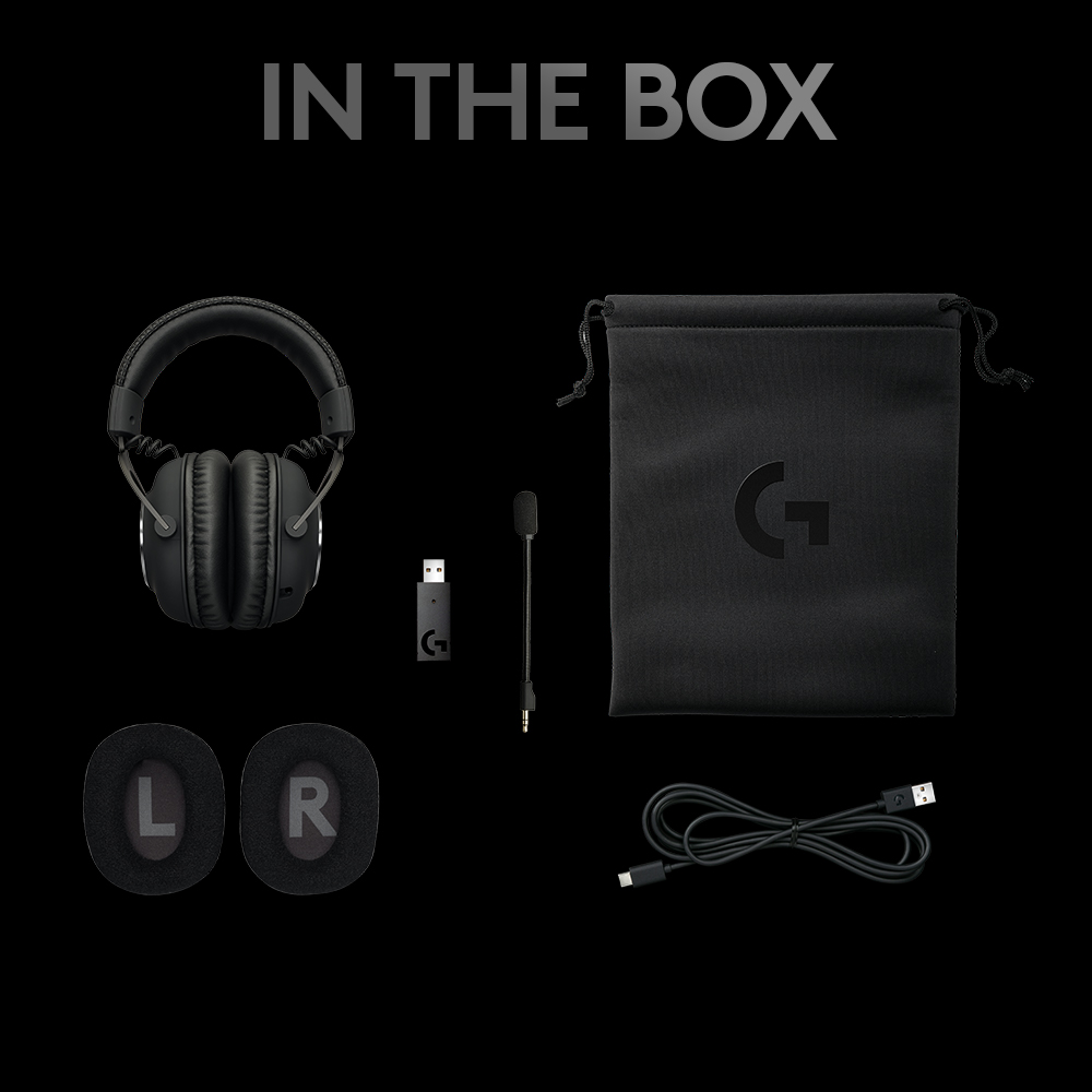 Inhalt eines Gaming-Headset-Kartons: Headset, Mikrofon, Adapter, Kabel und Ohrpolster. Schwarzer Hintergrund.