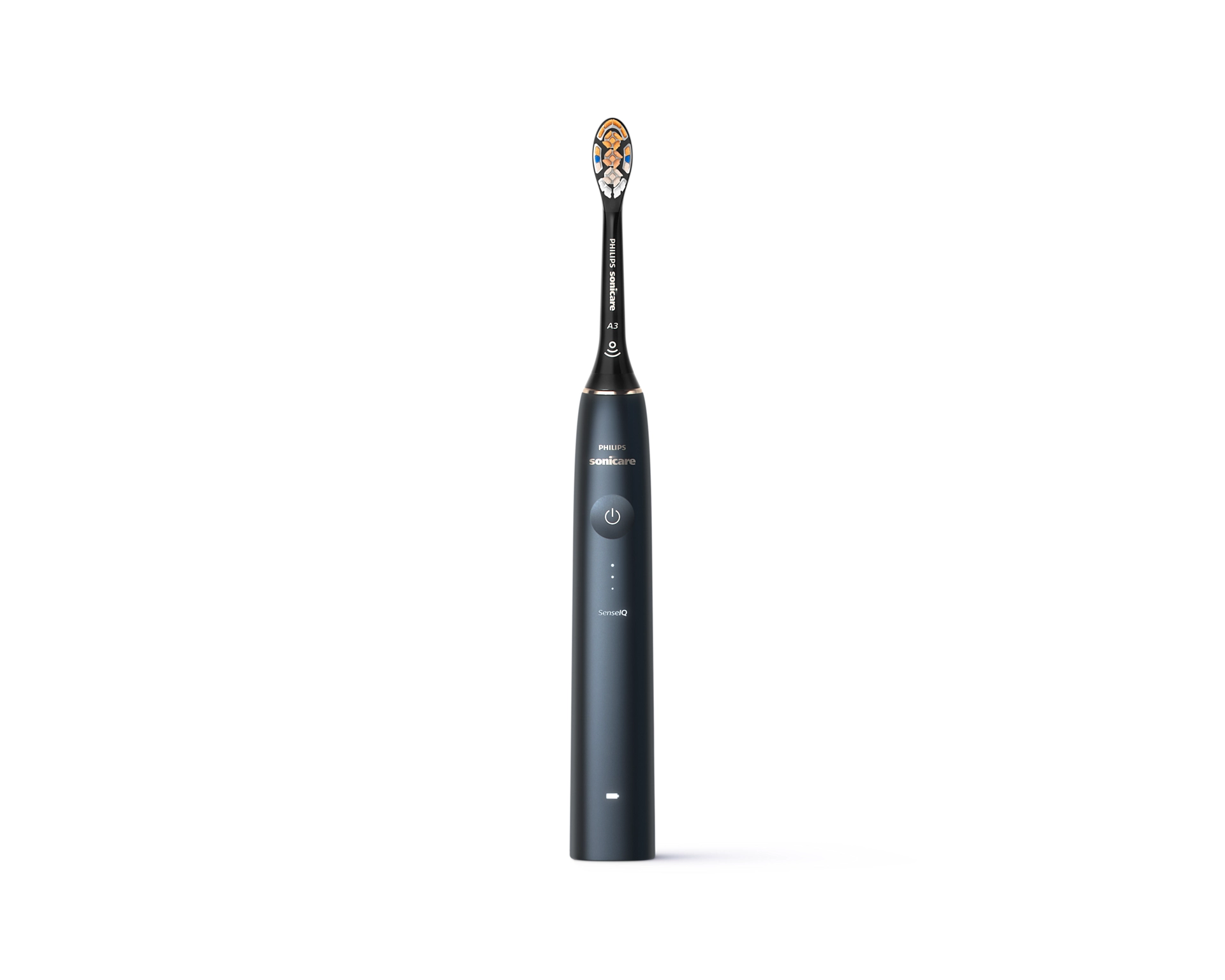 An electric toothbrush on a white background. It is dark gray with a black head.