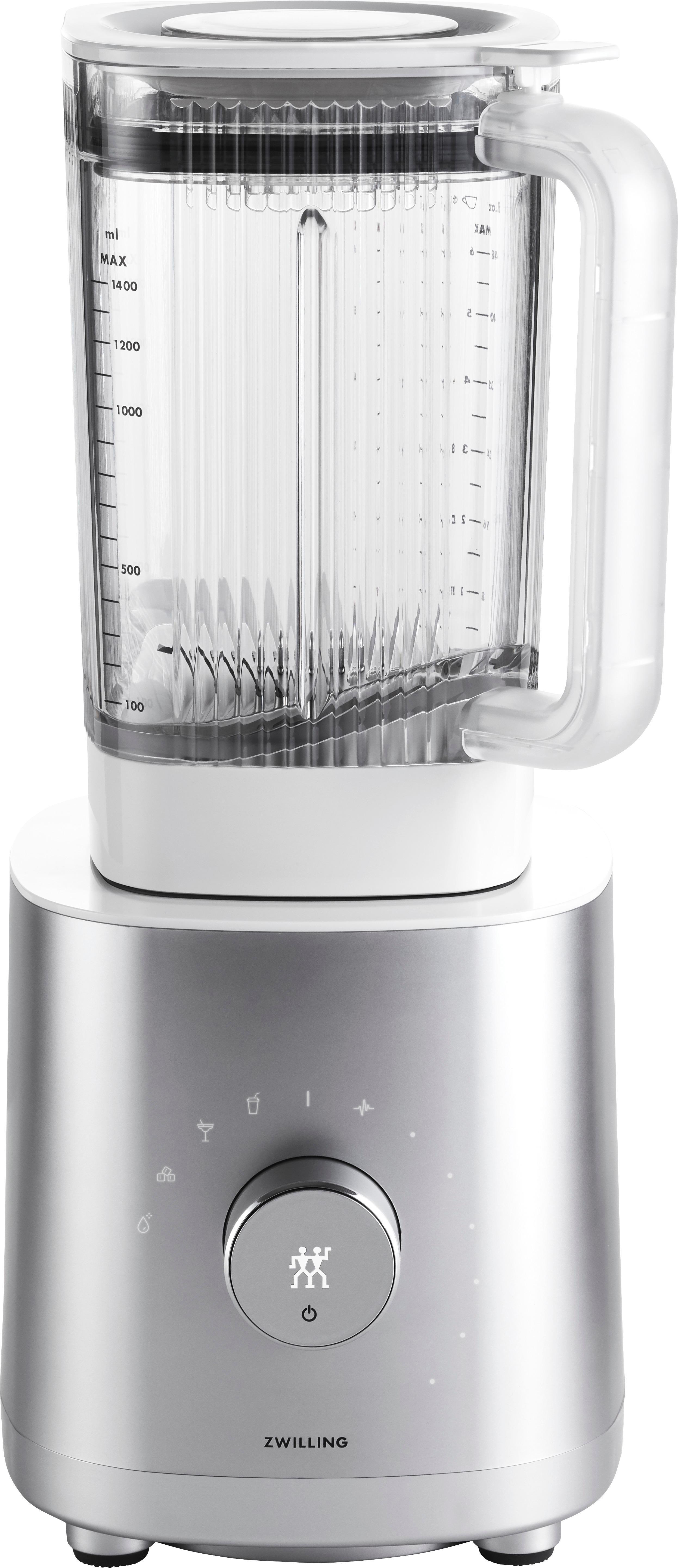 Silberner und weißer Mixer mit einem transparenten Glas. Das Bedienfeld hat einen Drehregler und Symbole.