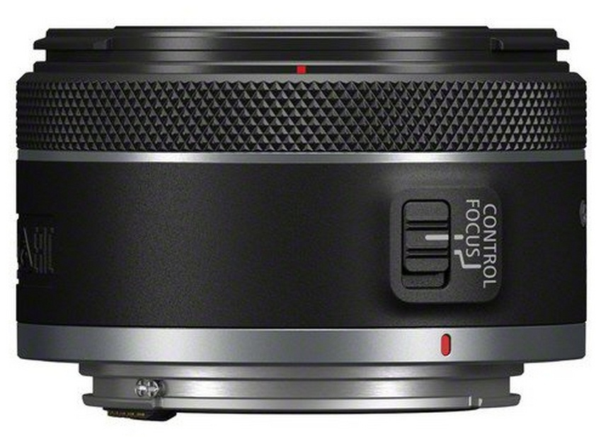 A black camera lens with a silver base, showing the control focus and focus ring.