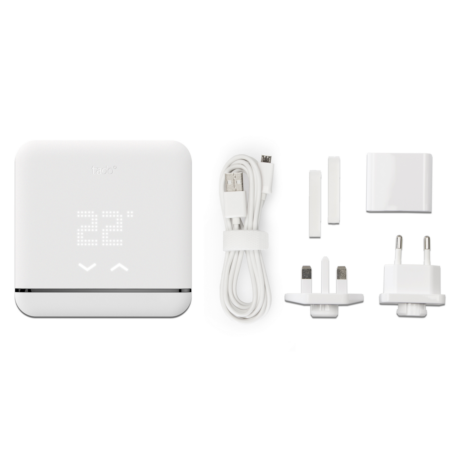 Termostato inteligente blanco con pantalla digital. Incluye adaptadores de corriente y cable.
