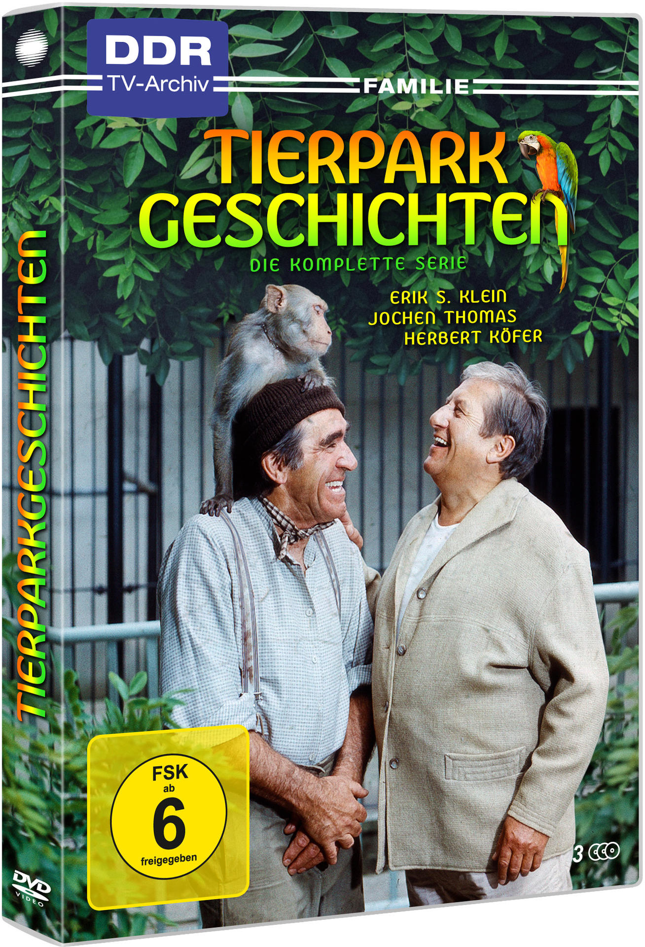 DVD-Hülle von 'Tierpark Geschichten'. Zwei Männer lächeln. Ein Affe auf der Schulter eines Mannes. Ein Papagei oben.