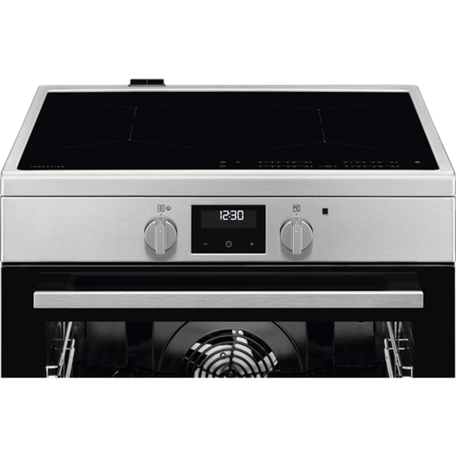 Oven with open door, digital display showing time, and control knobs.