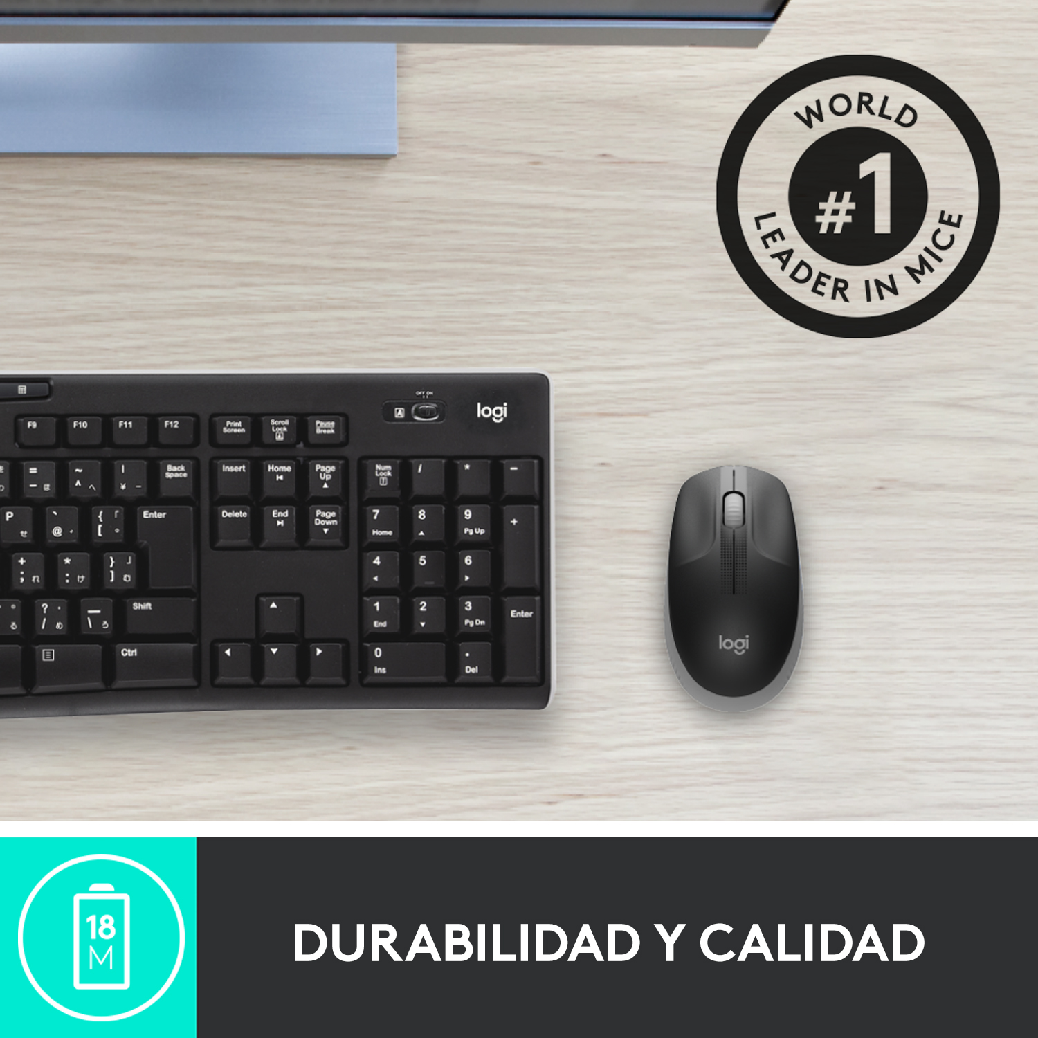Un teclado y ratón Logitech negros sobre un escritorio de madera, con las palabras "World Leader in Mice".