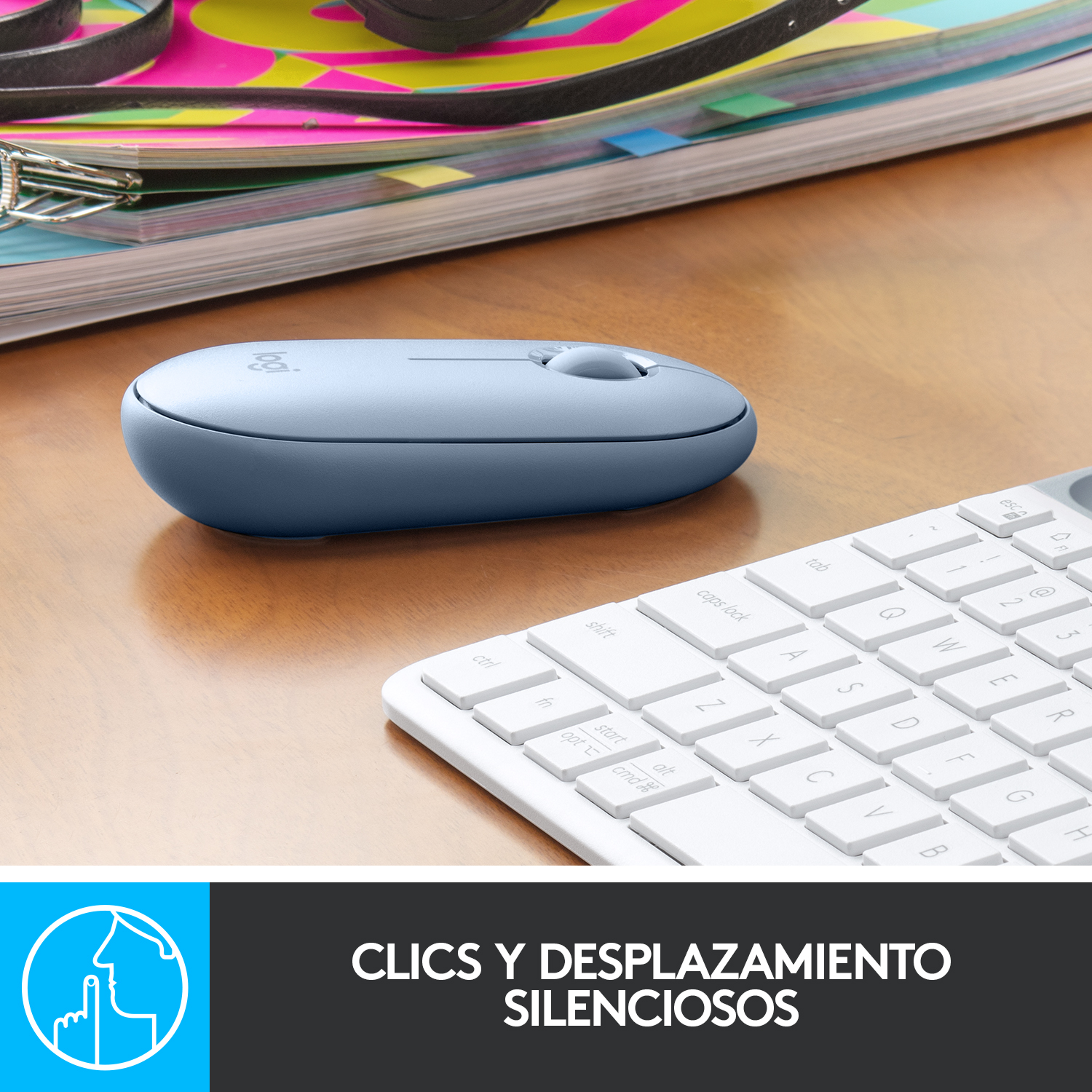 Ratón azul cerca de un teclado. El texto dice 'Clics y desplazamiento silenciosos'.