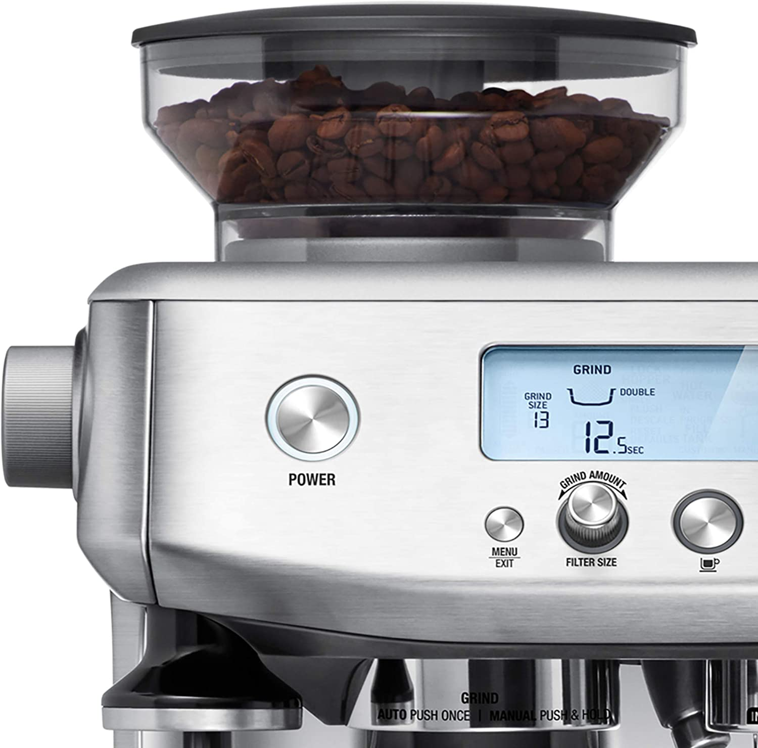 Close-up of a silver coffee machine with a transparent bean hopper. Display showing grind settings.