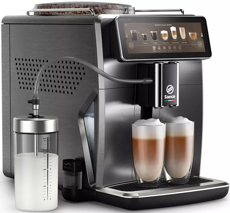 Una macchina da caffè in acciaio inossidabile con contenitore del latte e due bicchieri di latte.