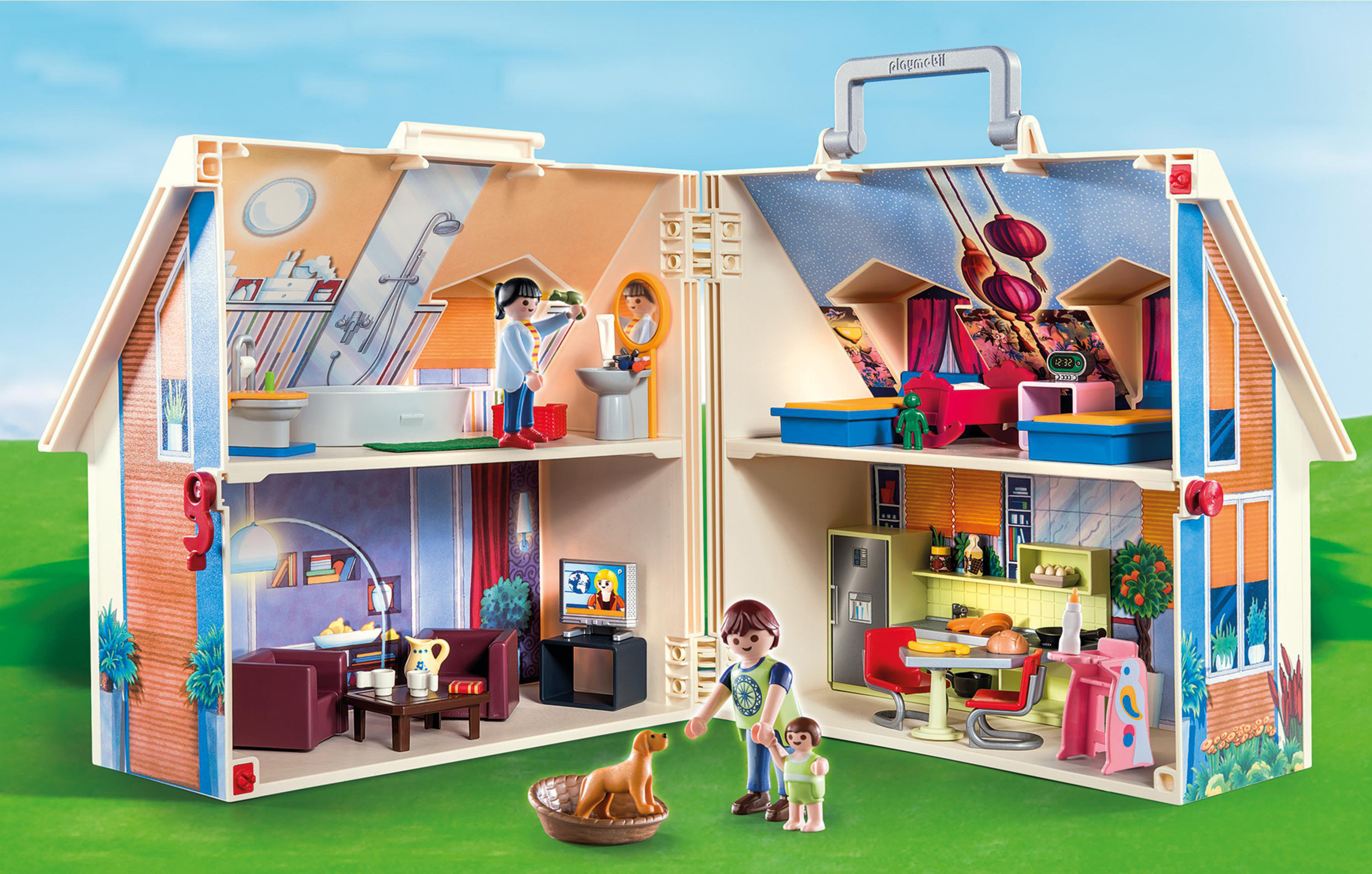 Ein Puppenhaus mit mehreren Zimmern. Menschen und ein Hund sind im Haus.