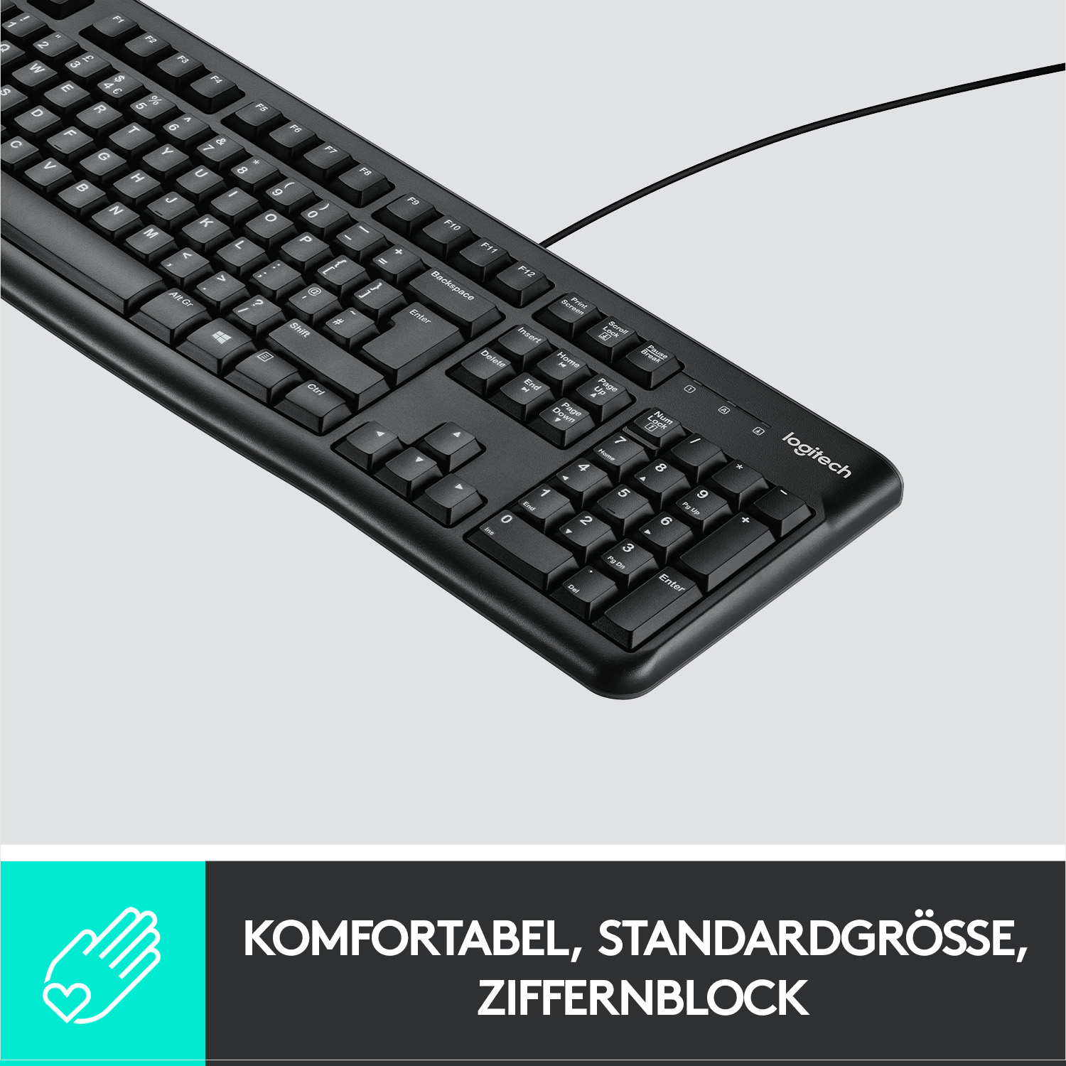 Schwarze Computertastatur mit Tasten und Kabel. Die Tastatur hat einen Ziffernblock.