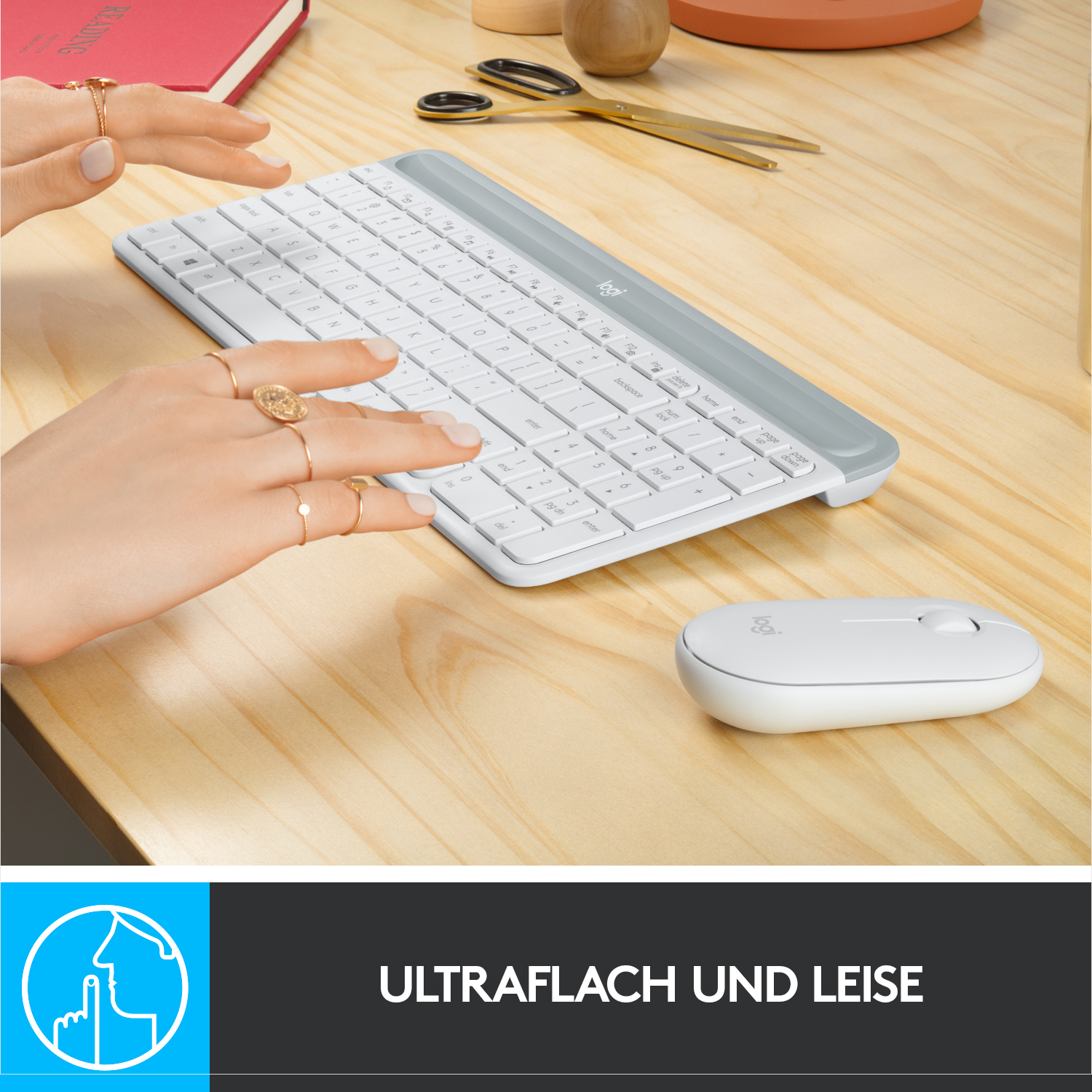 Schwarzer Stift an der Tastatur befestigt.