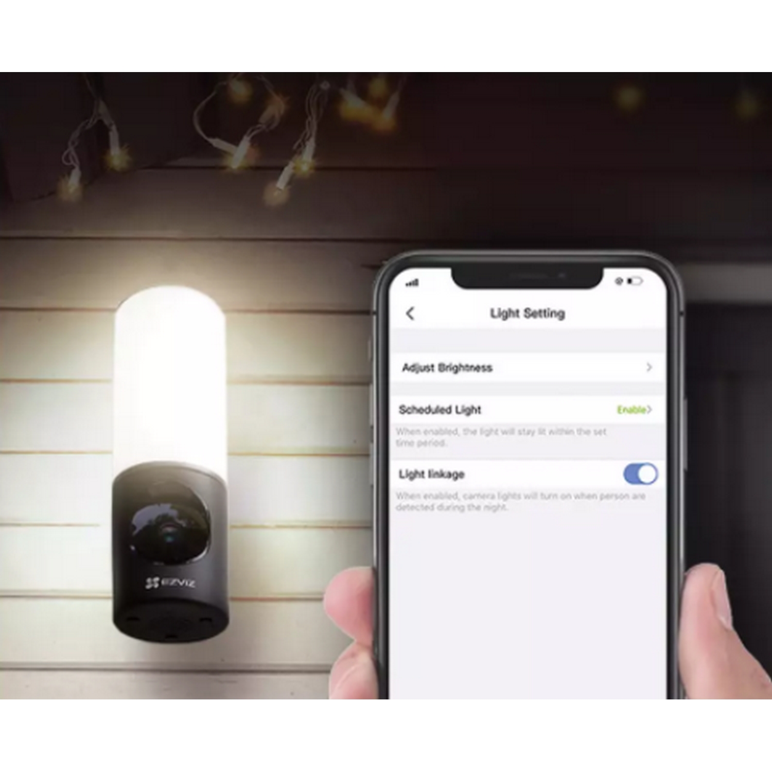 Una luz nocturna de cámara de seguridad y una pantalla de teléfono inteligente.