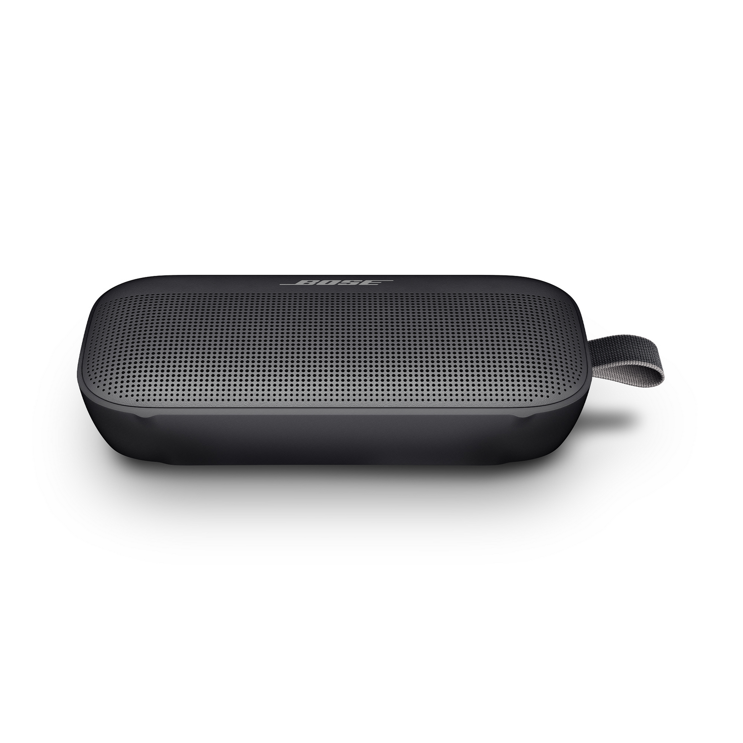 Altavoz Bose negro y rectangular con asa. Rejilla de altavoz perforada.