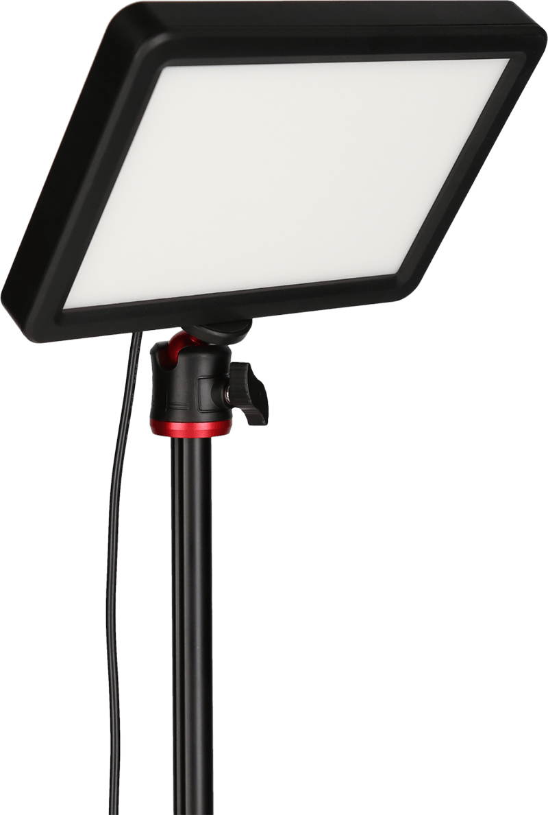 Lampe LED sur un pied. Elle a un cadre noir, une lumière blanche. Le pied est noir et rouge.