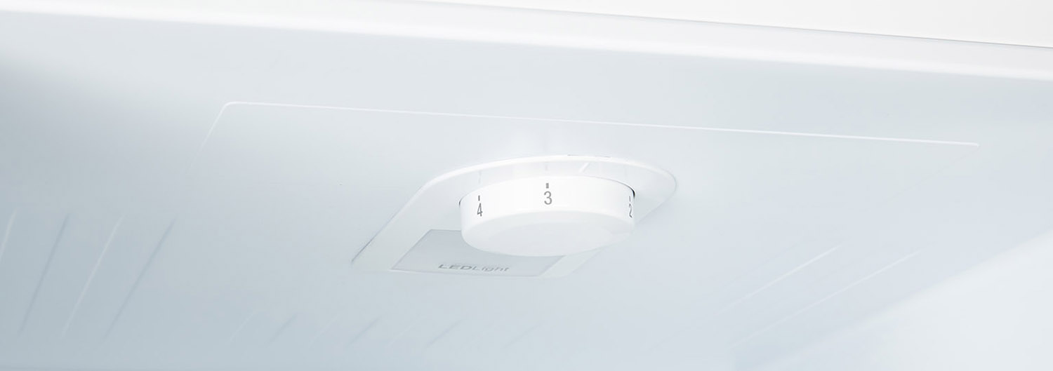 White refrigerator interior with a light control dial labeled 2,3,4. LED LIGHT is below it.