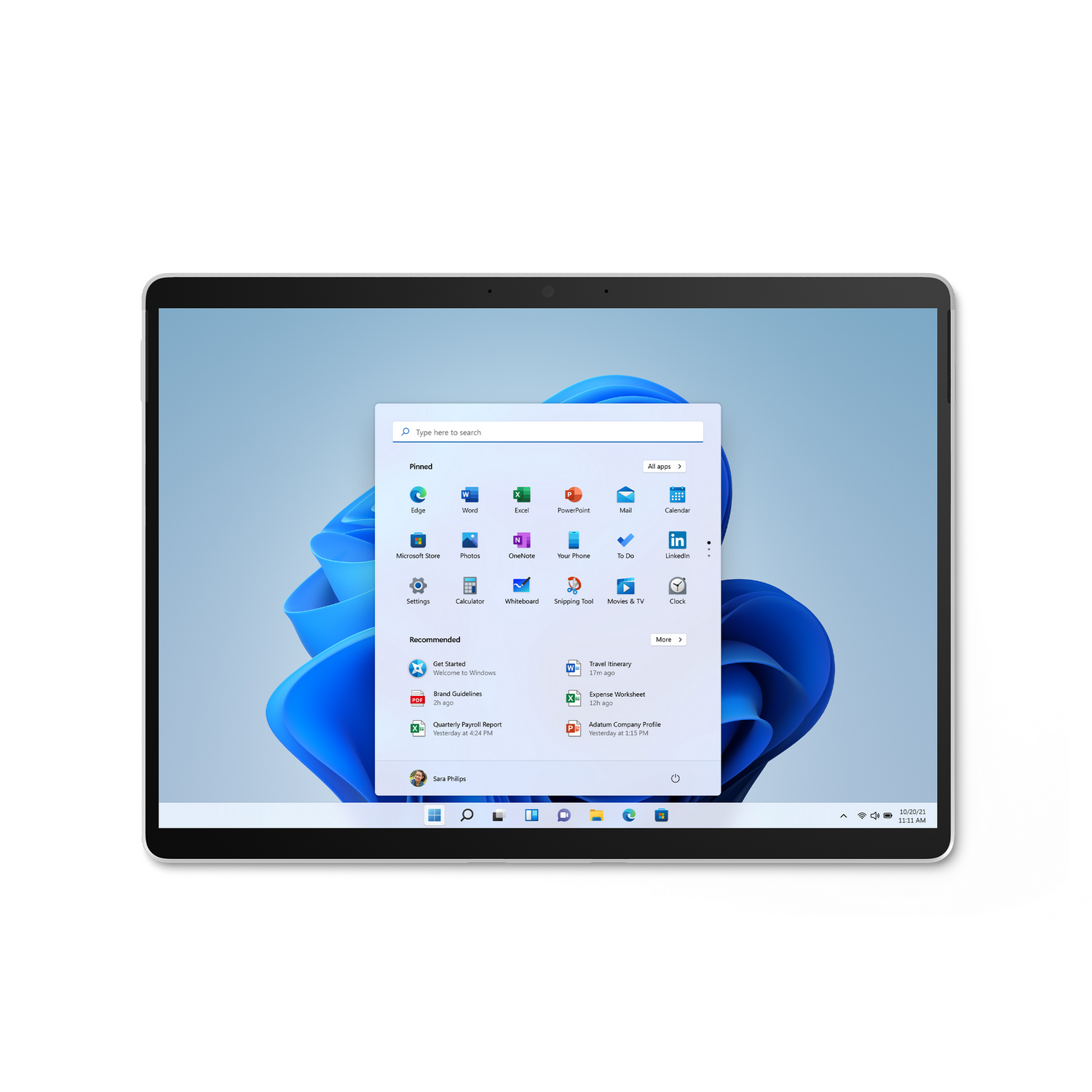 Una tableta negra muestra la interfaz de Windows 11 con la barra de búsqueda abierta.