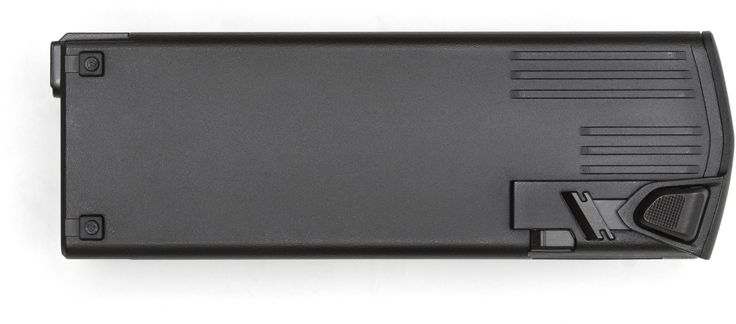 Een zwart rechthoekig batterijpakket met een getextureerd oppervlak en een kleine knop.