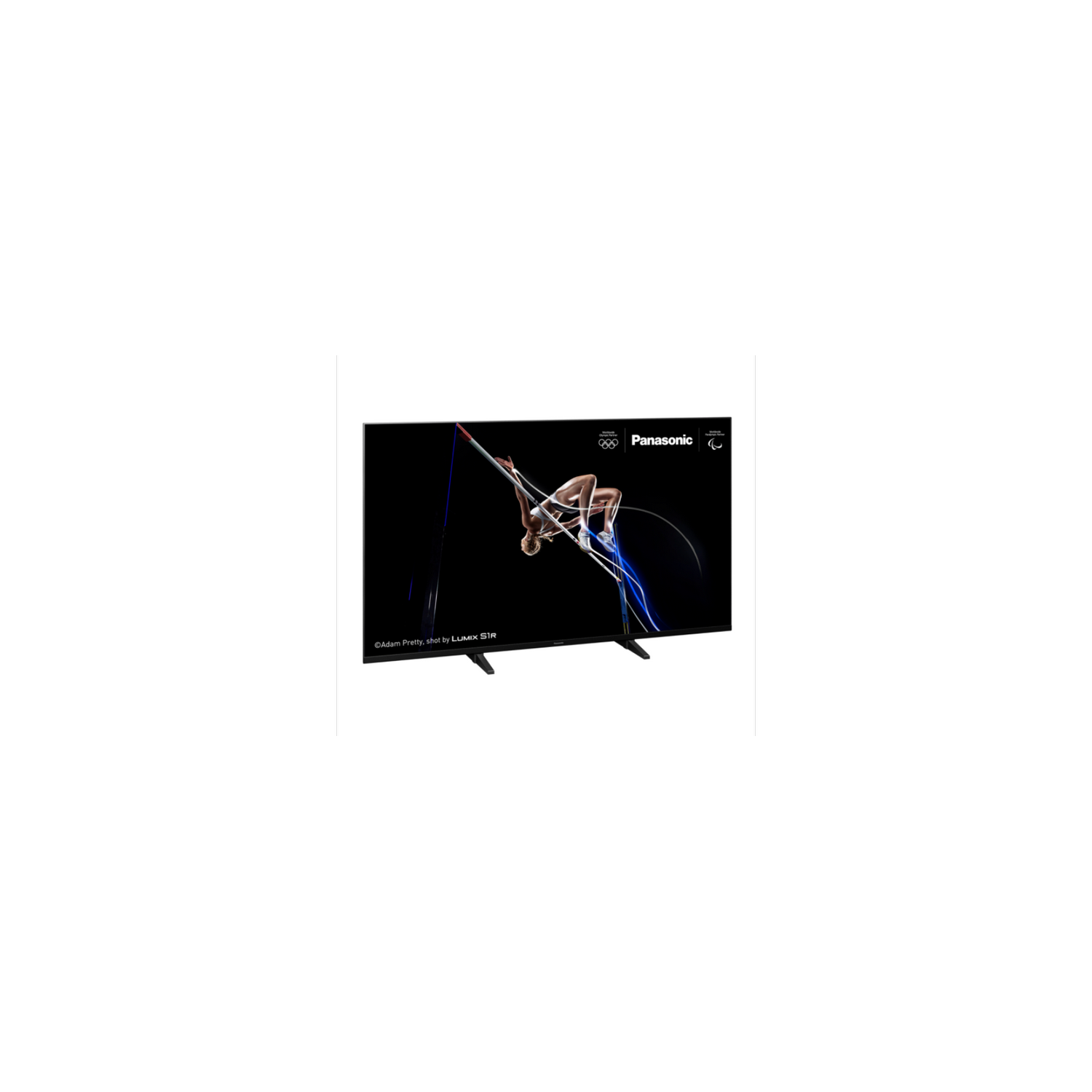 Pantalla de TV con un gimnasta en acción y el logo de los Juegos Olímpicos.