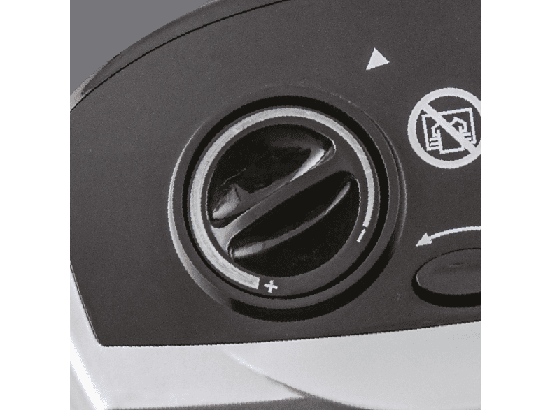 Close-up of a dial with + and - symbols, and other symbols.