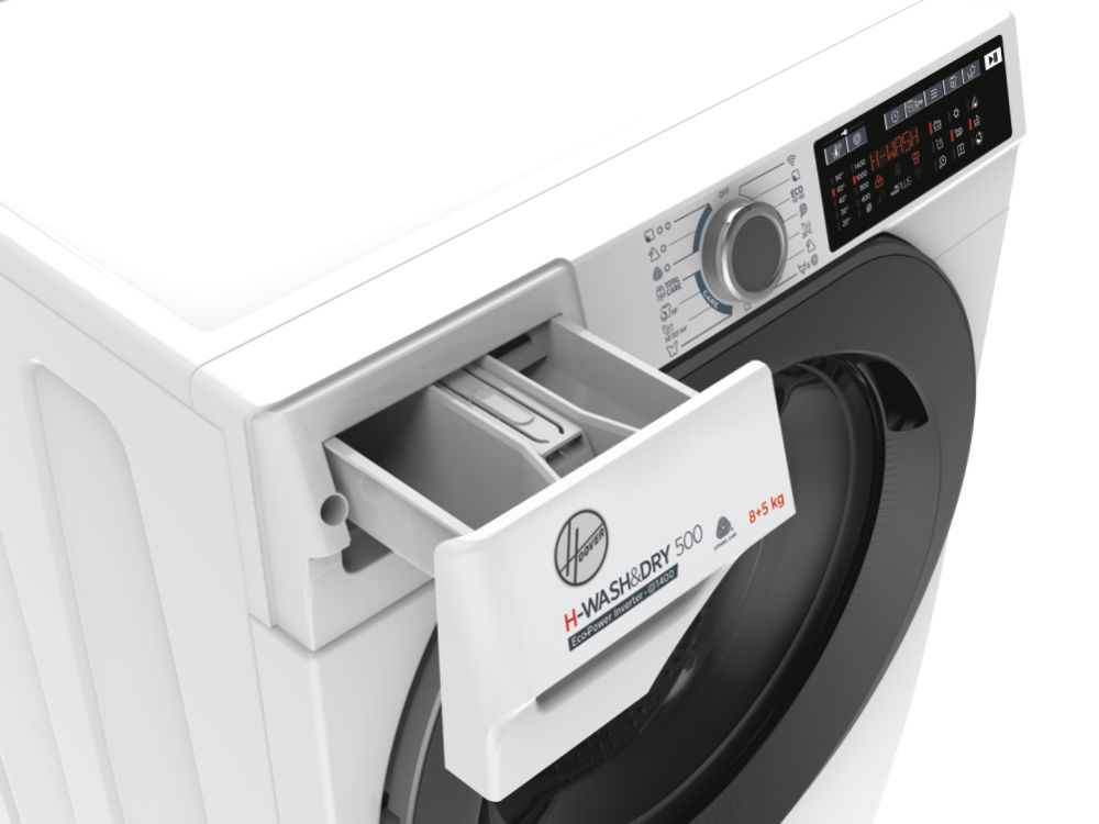 Gros plan sur un lave-linge blanc avec tiroir à détergent ouvert, montrant les compartiments internes.
