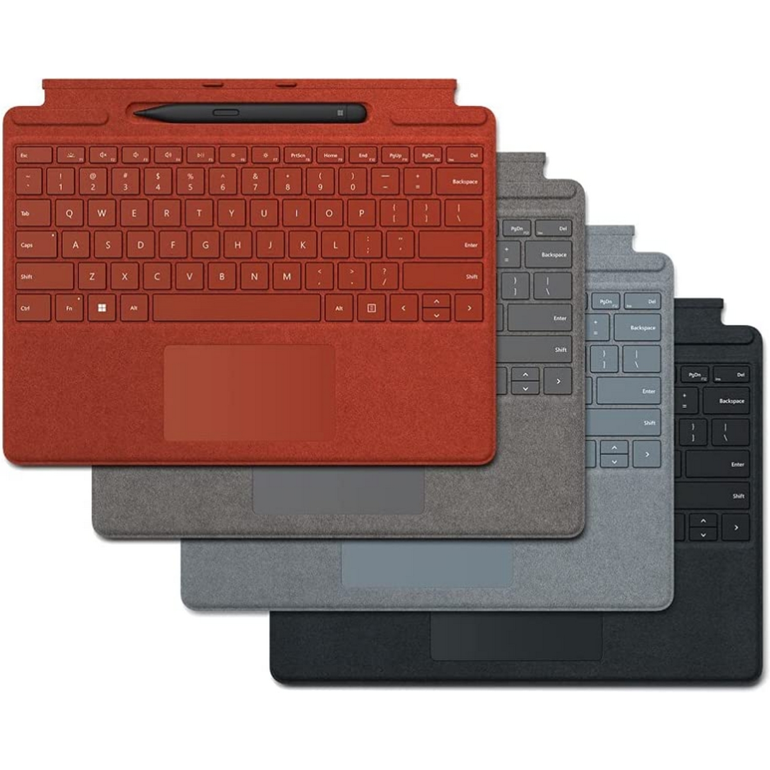 Cuatro cubiertas de teclado Microsoft Surface de colores con un lápiz, sobre una superficie blanca.