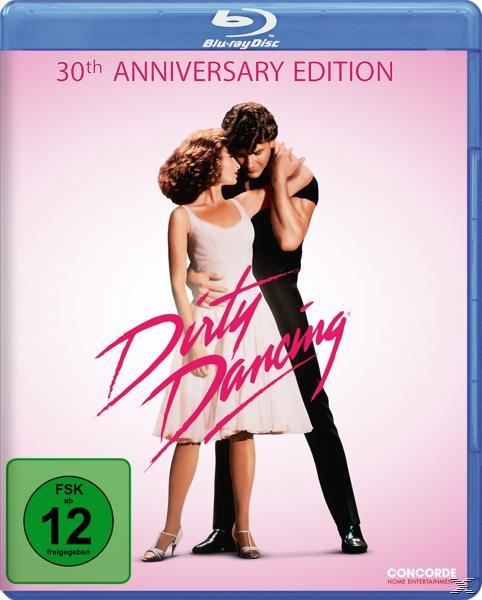 Dirty Dancing Blu-ray Cover, mit tanzendem Paar. Pinker Hintergrund mit Titel und Text.