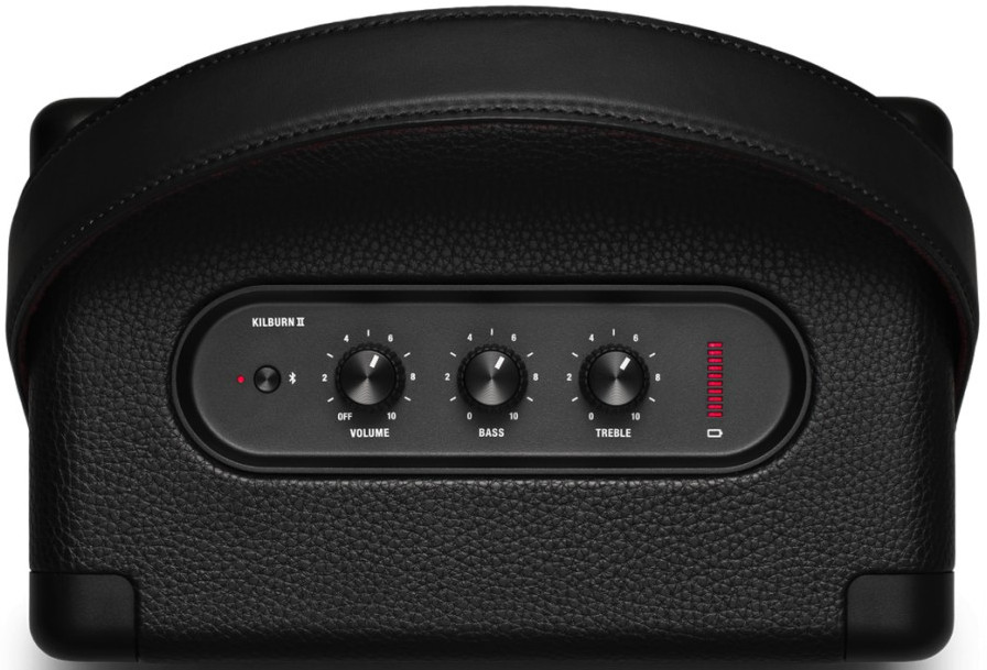 Close-up of a black Kilburn II speaker. It features control knobs, a handle, and a red light indicator.