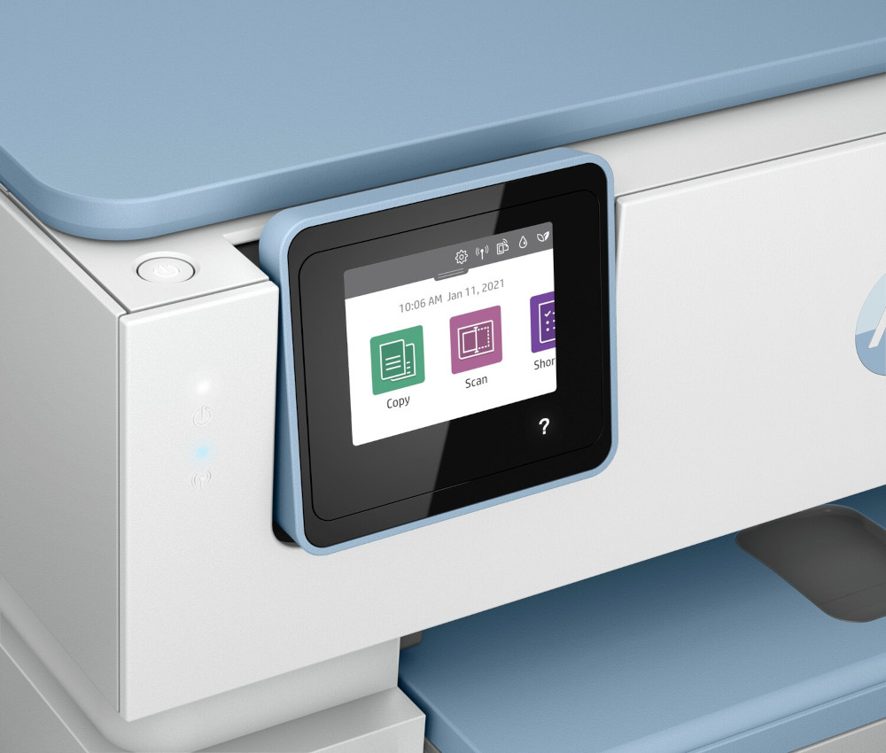 Printer display screen, close-up. Shows copy, scan, and shortcut icons. White and blue printer.