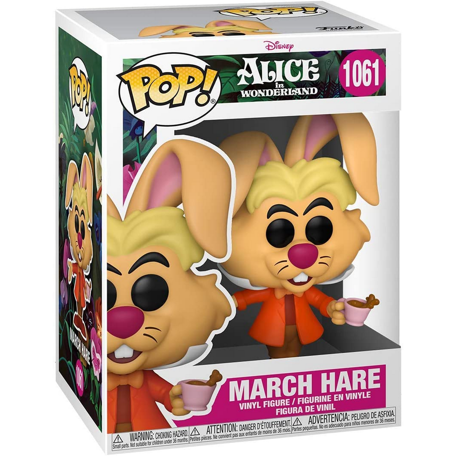 Figura de la Liebre de Marzo de Alicia en el País de las Maravillas en una caja. Es un conejo blanco con abrigo naranja.