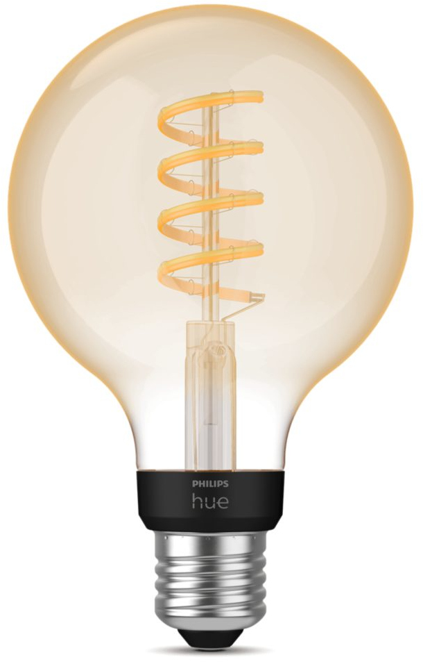 Une grosse ampoule teintée de jaune avec un filament en spirale à l'intérieur, une base noire et une vis argentée.