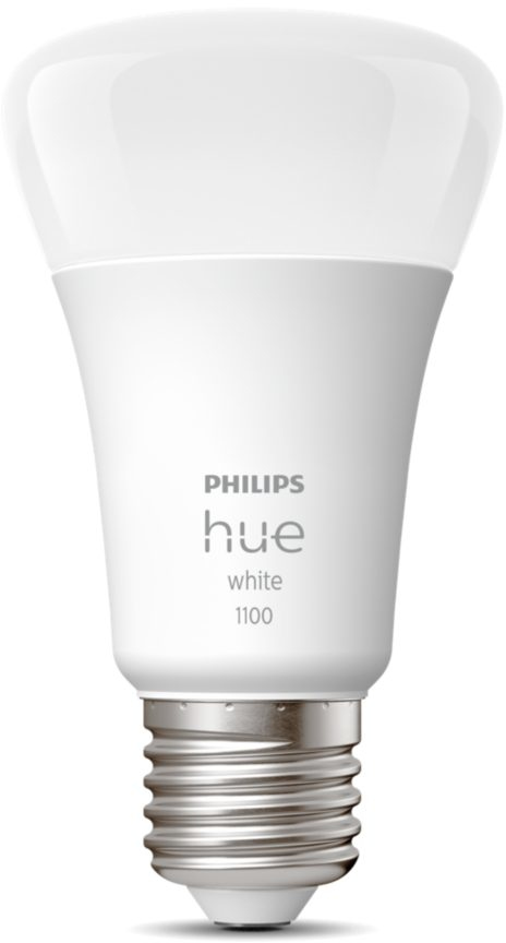 A white Philips Hue smart light bulb. It is an elongated bulb with a standard screw base. 