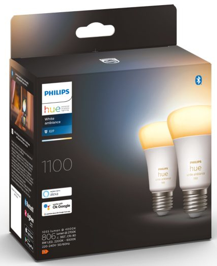Box of Philips Hue smart light bulbs. Two bulbs are illuminated and visible from the box.