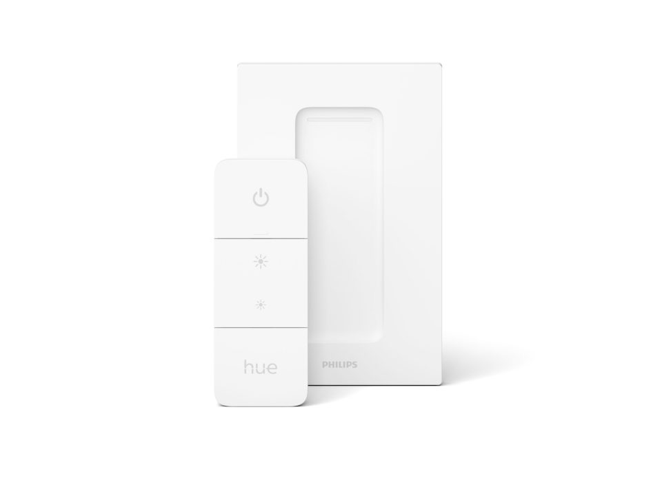 Düğmeleri ve duvar montajı olan beyaz bir Philips Hue akıllı anahtarı.