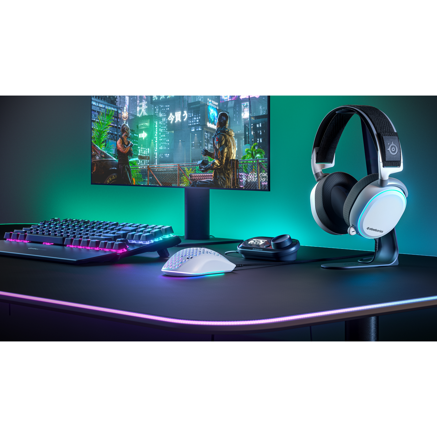 Configuración de juego con monitor, teclado, ratón, auriculares e iluminación de escritorio.