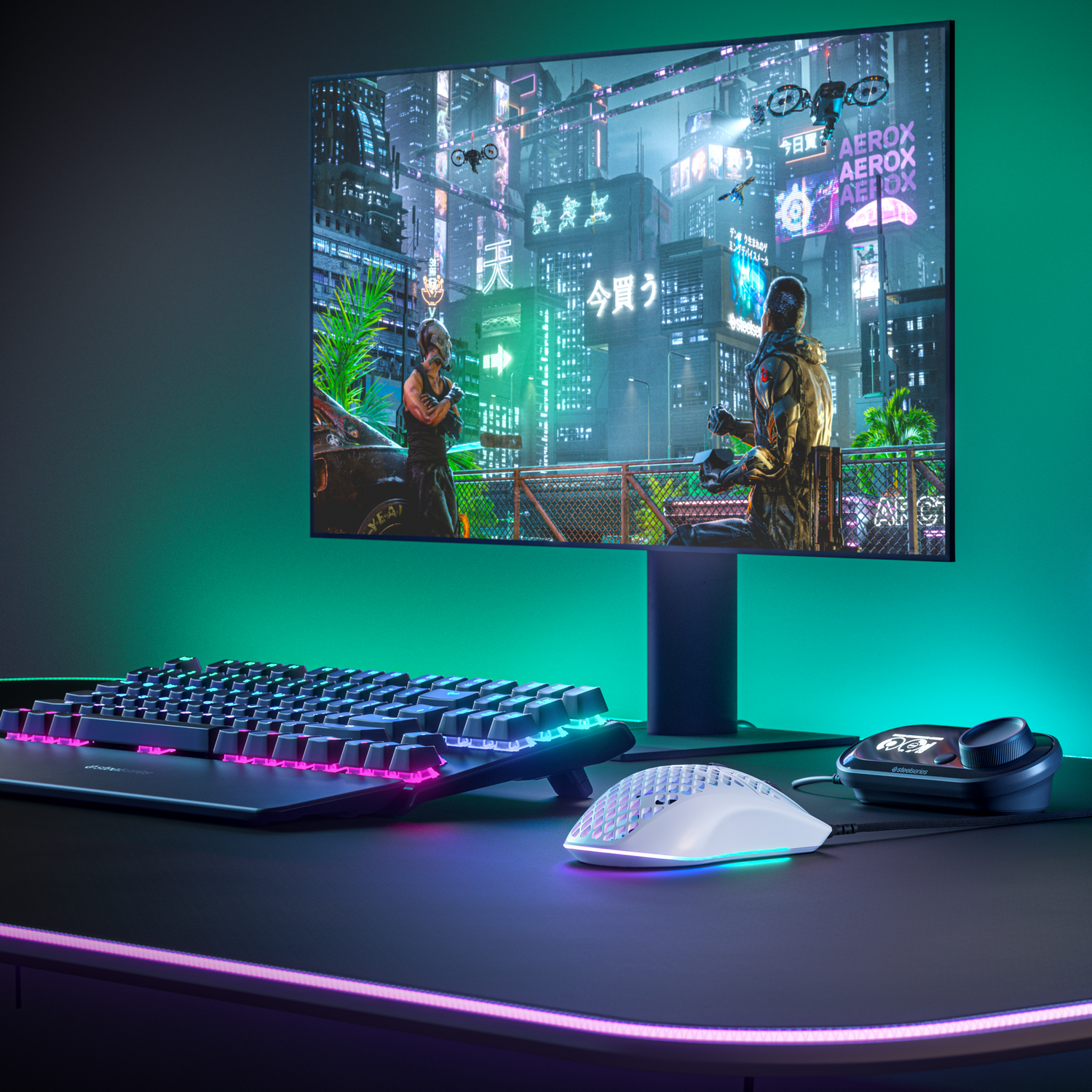 Una configuración de juego con un monitor, teclado, ratón y un controlador.