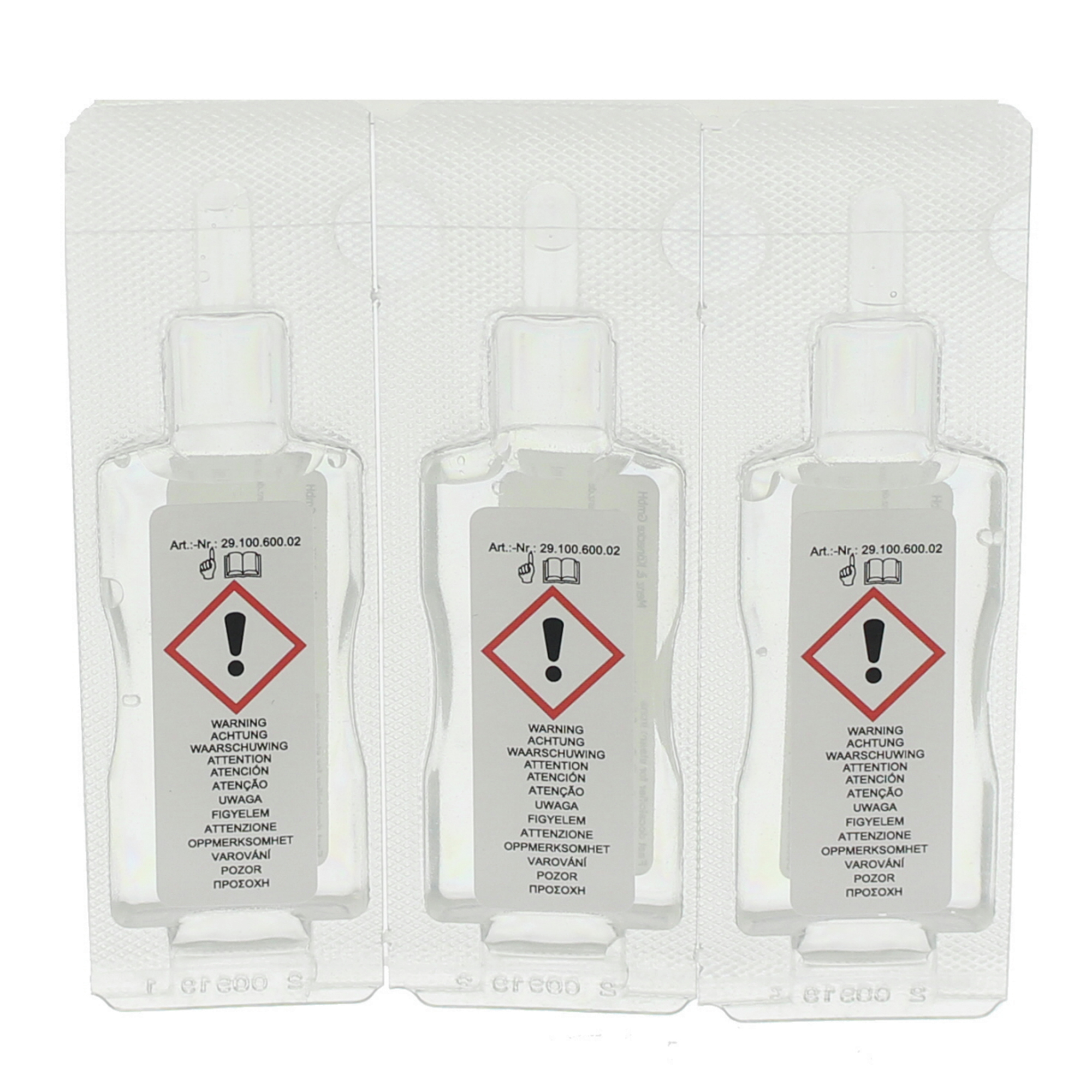 Trois petites bouteilles d'un liquide avec des symboles d'avertissement.