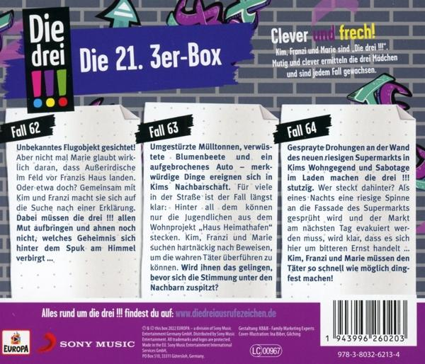 Rückseite einer dreiteiligen Buchbox, die die Geschichte von drei Detektiven detailliert. Der Hintergrund ist eine Wand.