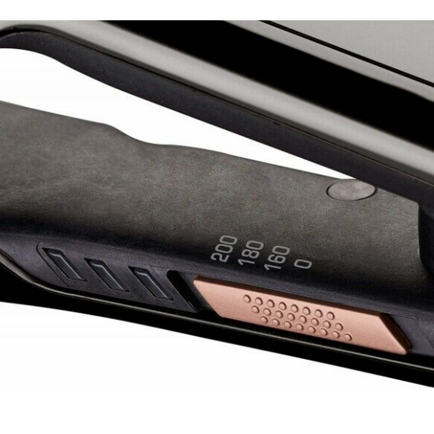 Un primer plano de una plancha para el cabello con ajustes de temperatura y un acento dorado rosa.