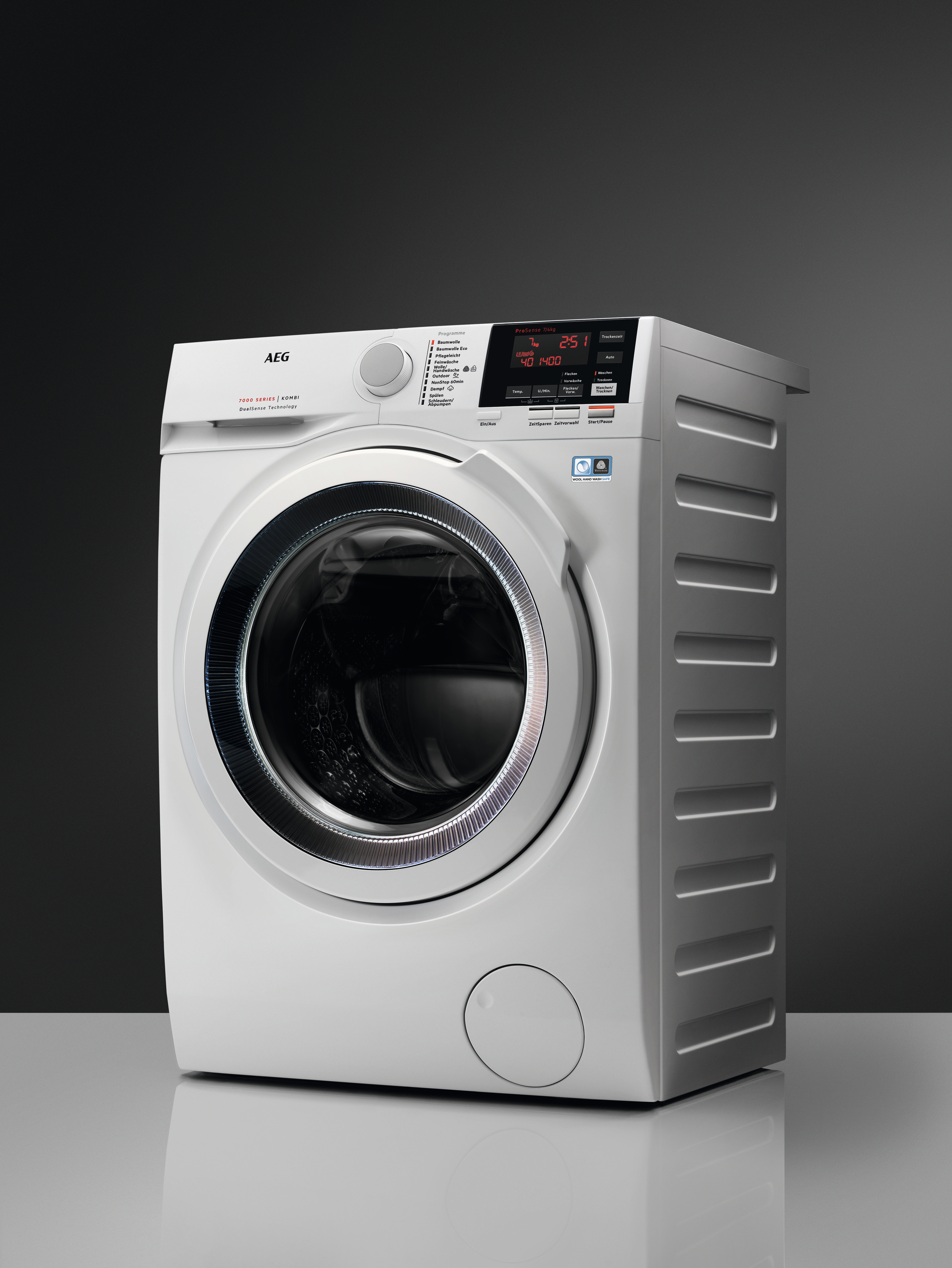 Weiße Waschmaschine, Vorderansicht, dunkler Hintergrund, modernes Design, elektronische Anzeige.