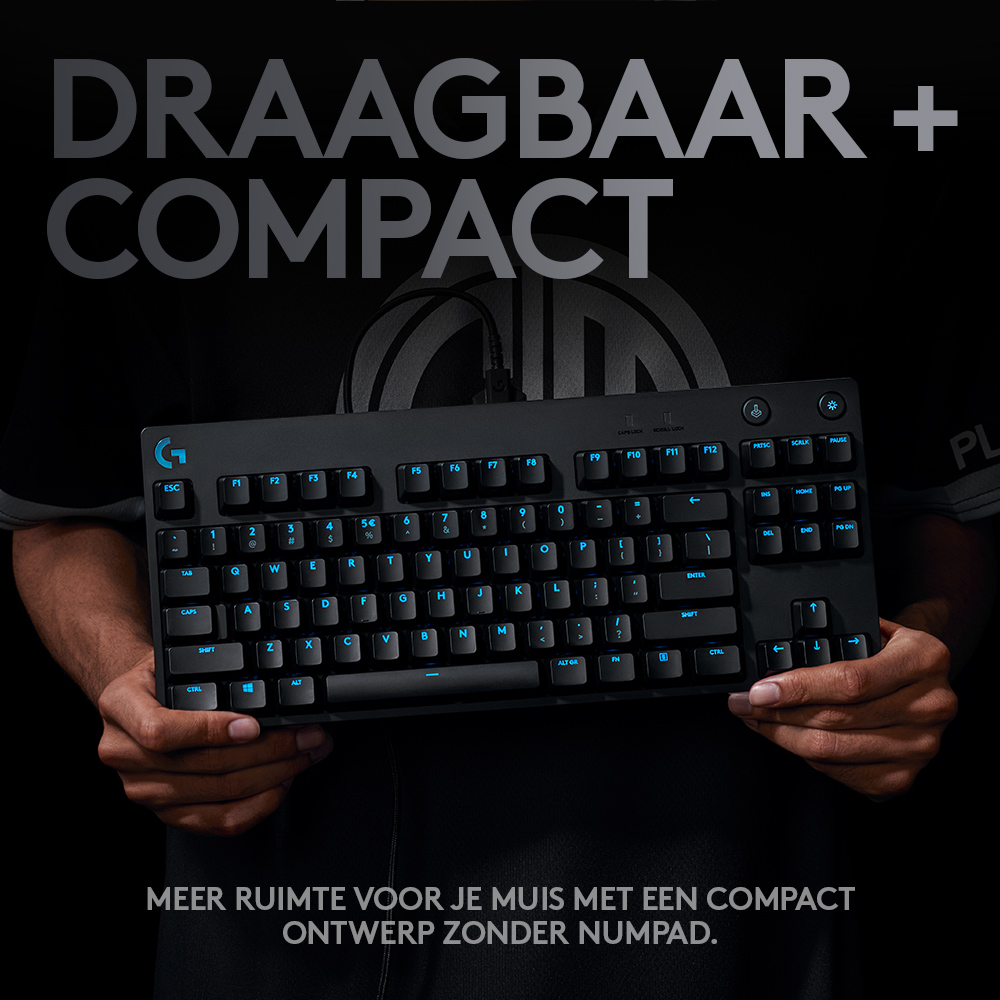 Black keyboard held by hands. White text on top, with keys visible. Bottom text: compact design, no number pad.