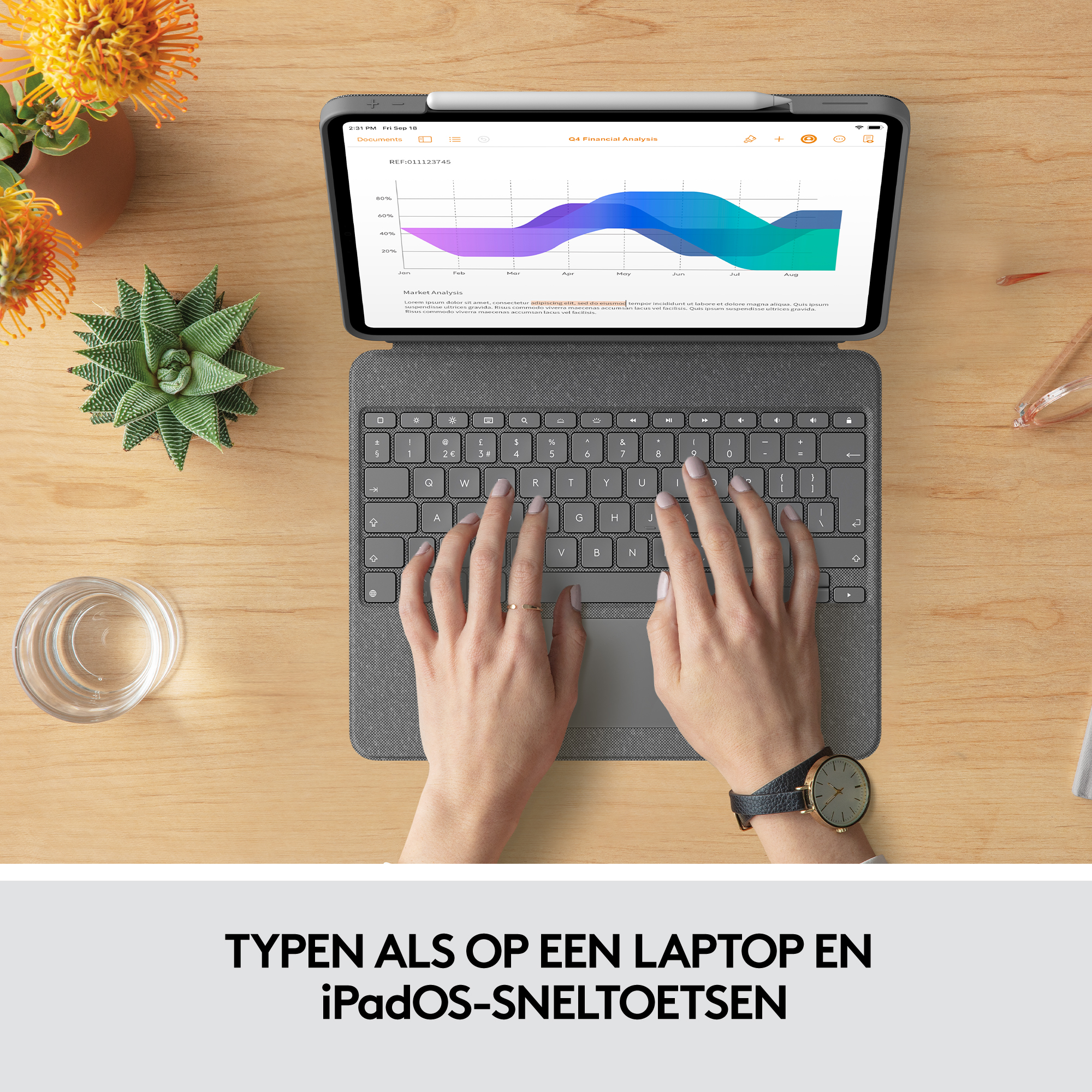A tablet with a keyboard case, showing hands typing and a financial analysis chart.
