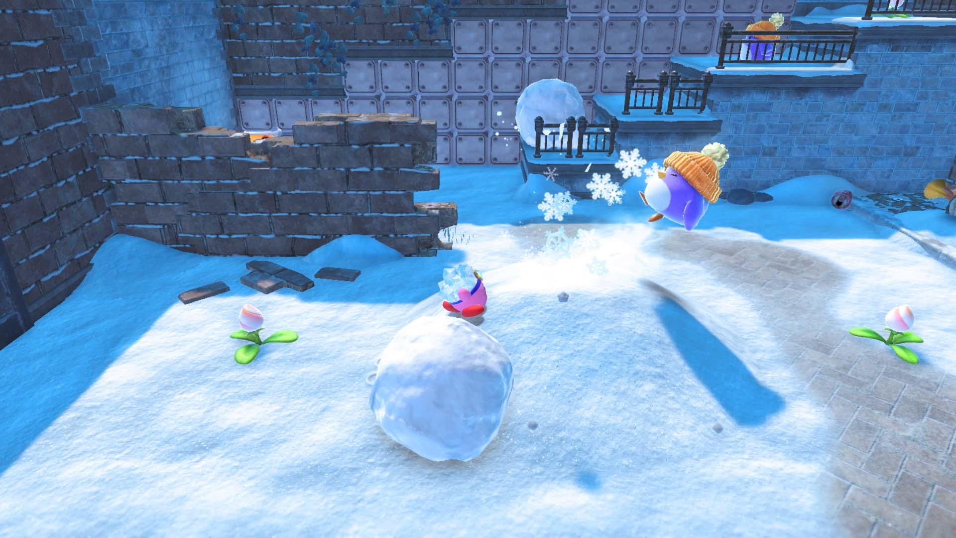 Una scena di videogioco con personaggi in un ambiente innevato che lanciano palle di neve.