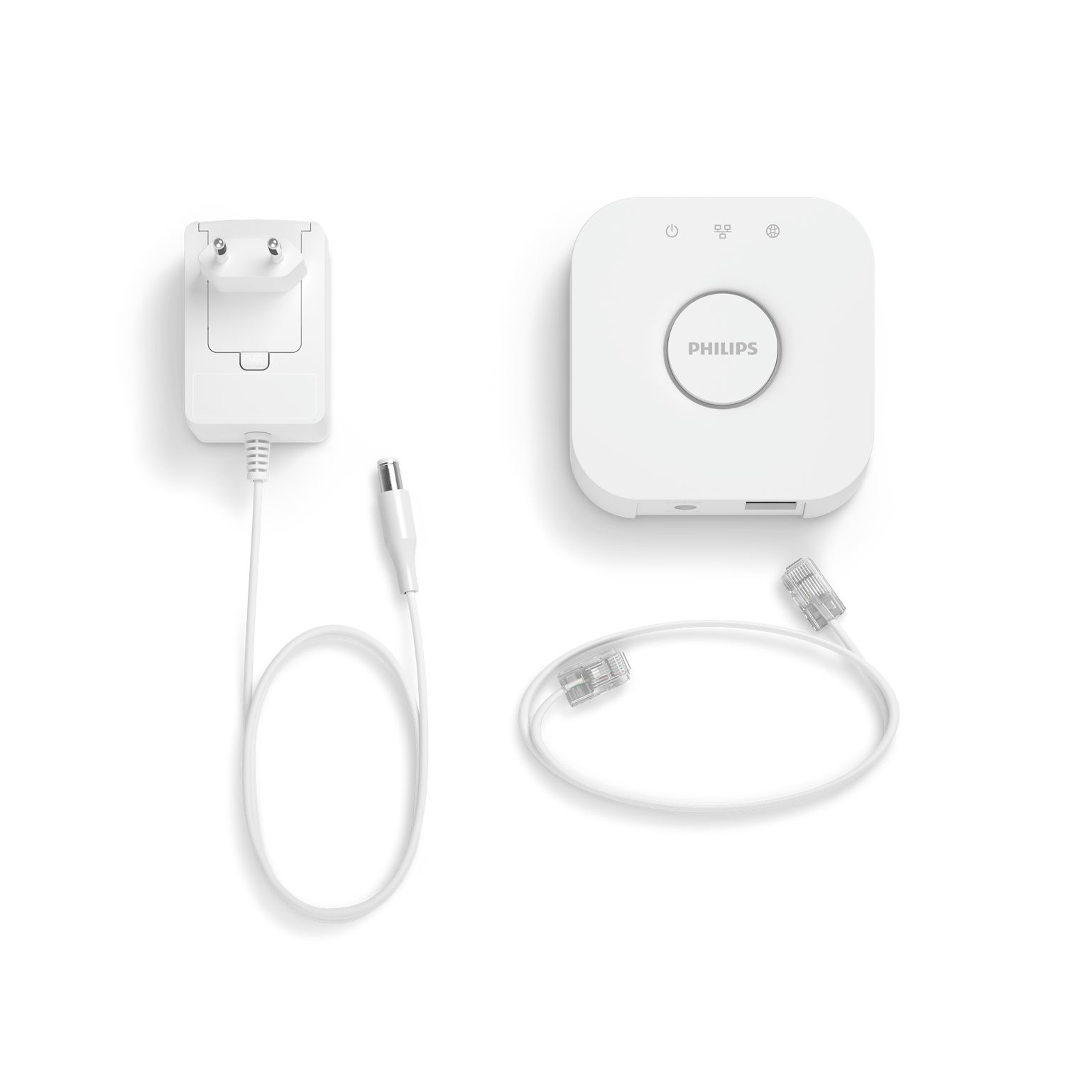 Hub de hogar inteligente Philips blanco con adaptador de corriente y cable Ethernet.