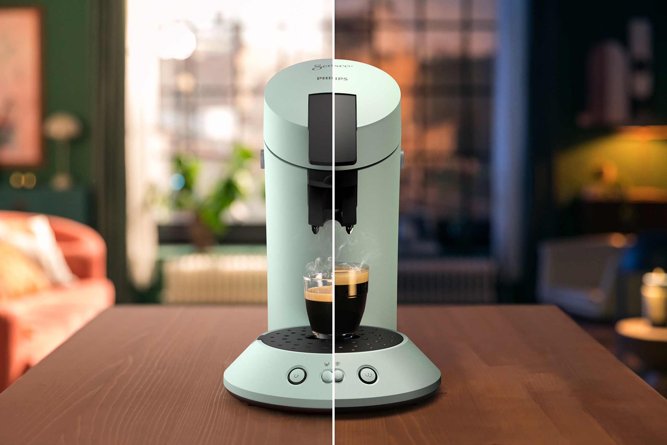 A mint-green Philips Senseo coffee machine with a cup of coffee.