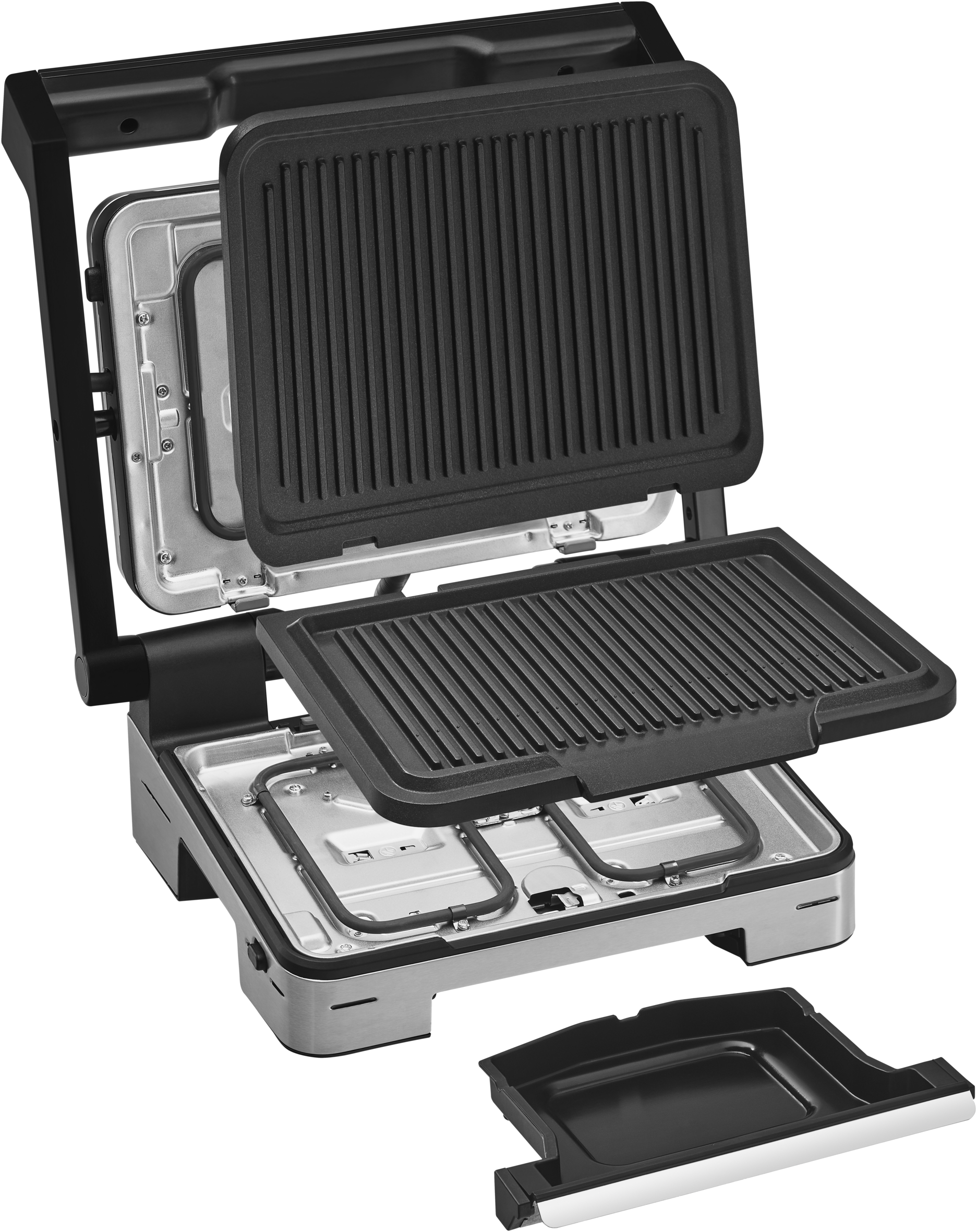 Ein schwarzer und silberner Grill mit Steaks auf einem Holzbrett.