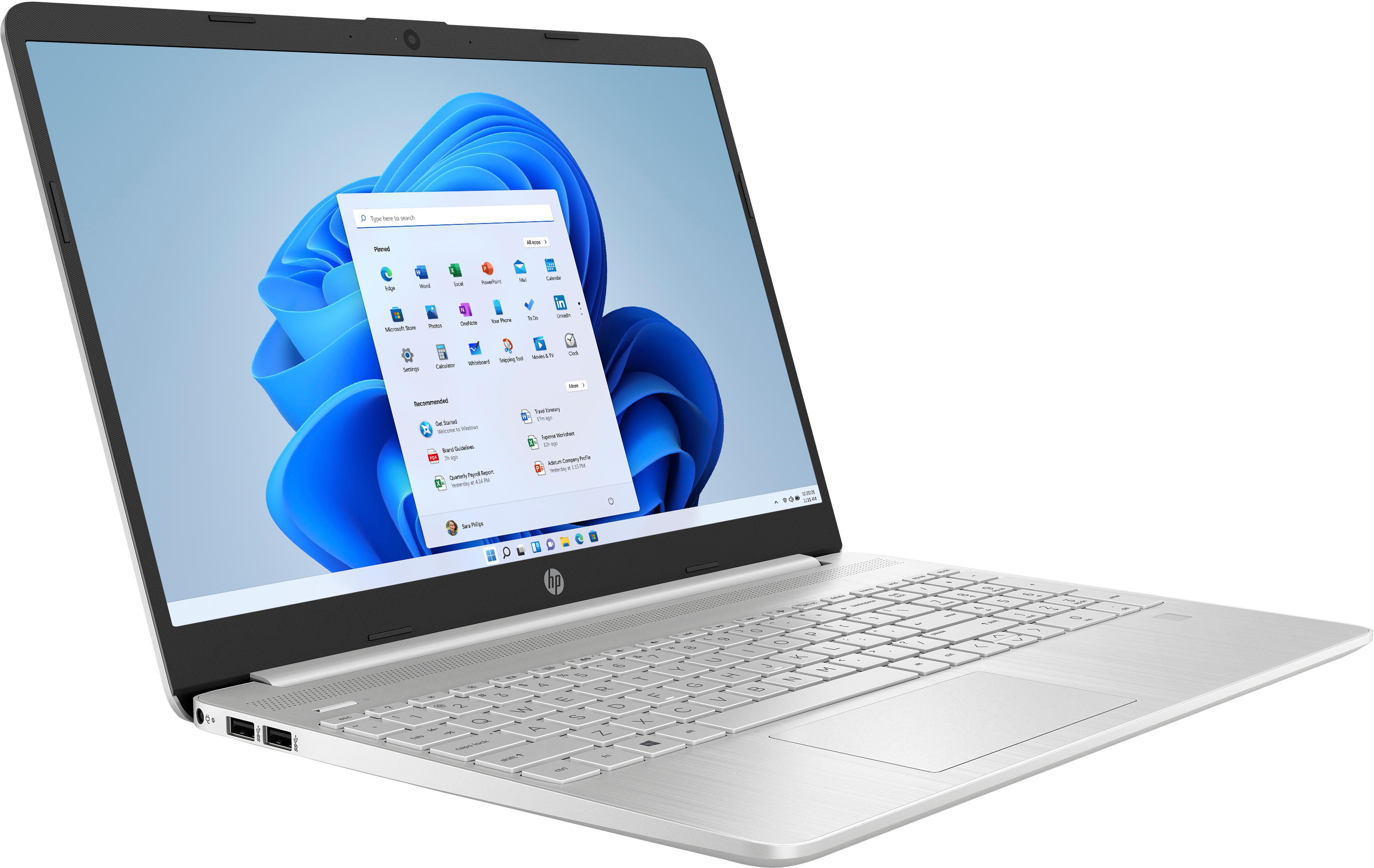 Un portátil plateado con la interfaz de Windows 11 abierta.
