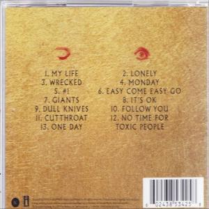 CD-Hülle mit Album-Trackliste und Barcode auf goldenem Hintergrund.