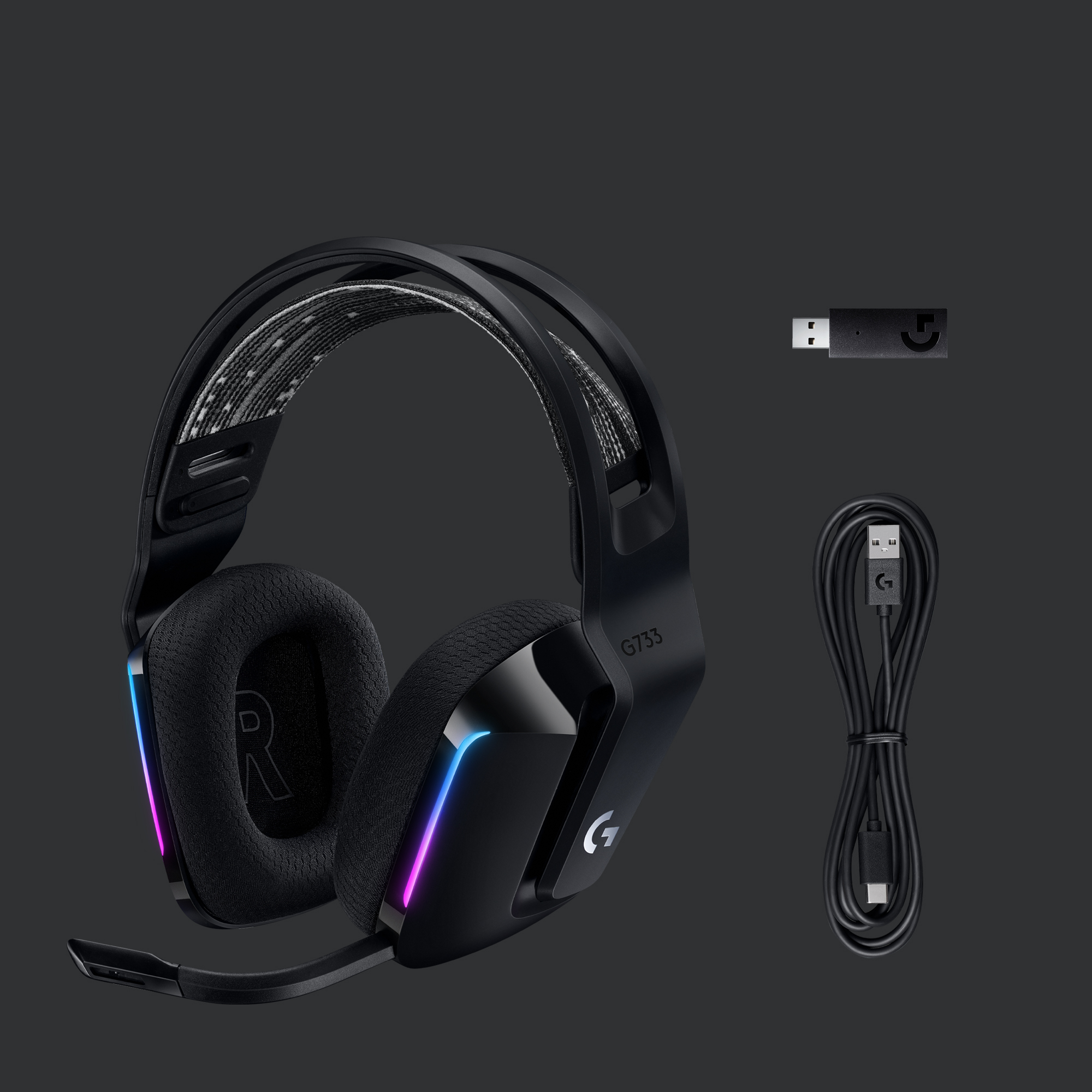 Black gaming headset with a microphone and cable. A wireless adapter and cable are included.