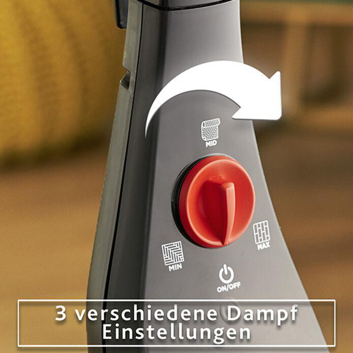 Nahaufnahme eines schwarzen Dampfreinigers. Er hat einen roten Drehknopf mit Einstellungen für verschiedene Dampfpegel.